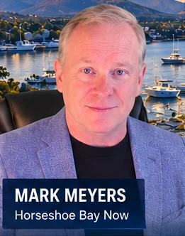 Mark Meyers smiling in his Texas News Studio broadcast jacket